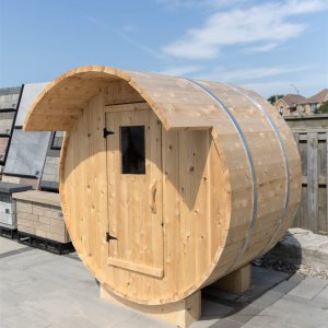 Barrel sauna kit three-quarter view with roof overhang